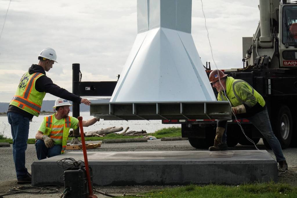 The Angel De Creatividad sculpture took flight on Wednesday as Ram Construction riggers move it in place. (Photo by Sam Fletcher)