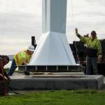 Ram Construction staff prepare to mount the Angel De Creatividad sculpture on its platform on Wednesday. (Photo by Sam Fletcher)