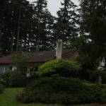 A house on Northeast Third Street in Coupeville suffered some damage to the bathroom but ultimately survived a Monday blaze. (Photo by Sam Fletcher)