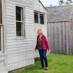 (Photo by Luisa Loi)
Victoria Shea peeks inside the Ferry House, which was once a tavern, a post office and an inn owned by the Ebey family.
