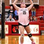 Photo by John Fisken
Katie Marti flicks a pass skyward.