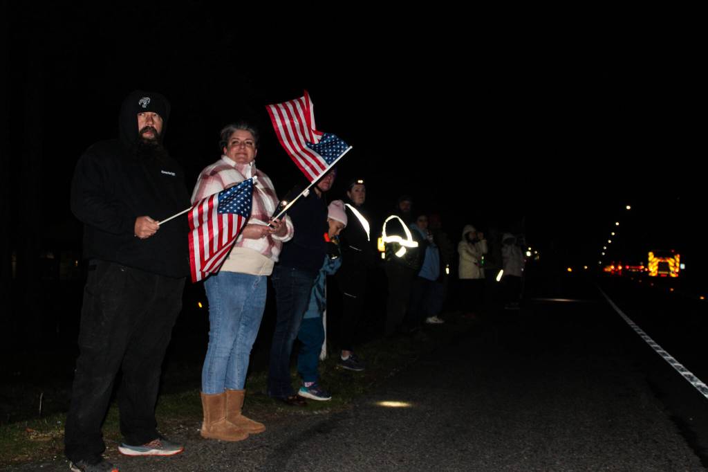 Photo by Sam Fletcher
Members of the Oak Harbor community show support during the procession of Lt. Serena Dug Wileman on Monday.