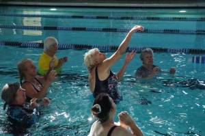 Patrons play volleyball at the John Vanderzicht Memorial Pool. (Photo by Sam Fletcher)