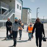 (Photo provided)
The Working on Whidbey crew walks on Navy Air Station Whidbey Island for a future episode.