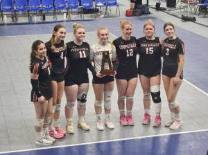 Photo provided
Seniors of the Coupeville High School volleyball squad pose with their trophy.
