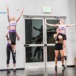 (Photo by Luisa Loi)
At left Abbigail Bliss, Ambria Provoncha, Jade Garcia and Aubree Blanchard practice a lift in a fast-paced two-and-a-half-minute choreography.