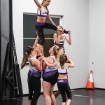 (Photo by Luisa Loi)
Mads Hettenbach, Maci Walker, Ambria Provoncha, Aubree Blanchard, Jade Garcia and Abbigail Bliss hold Adalyn Watson.