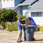 (Photo provided)
James Andersen fills an Island Disposal recycling container.