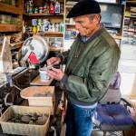 (Photo by David Welton)
John Schmidt sifts through his rock collection.