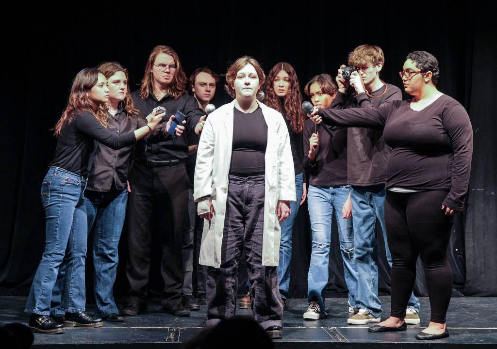 (Photo by Luisa Loi)
Rulon Stacey (played by Eclipse Garrett) announced Matthew Shepards death while surrounded by reporters in The Laramie Project, which opened at the Whidbey Playhouse in March.