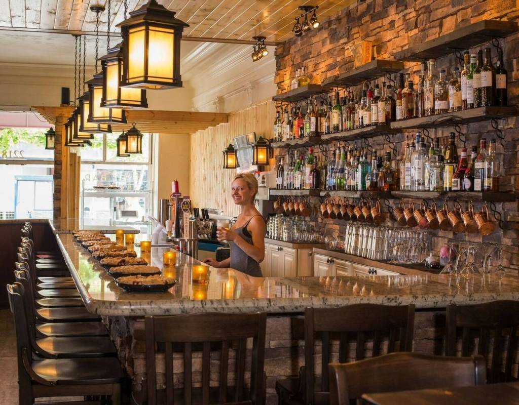Natalie Bleifuss, owner of Pie Bar, tends the bar in her Seattle Restaurant. (Photo provided)