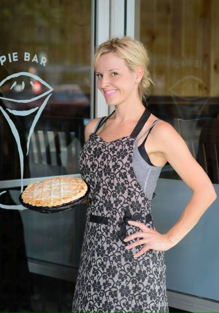 Natalie Bleifuss, a descendent of Whidbey Pioneer Samuel Maylor, holds a pie outside her Seattle restaurant. (Photo provided)