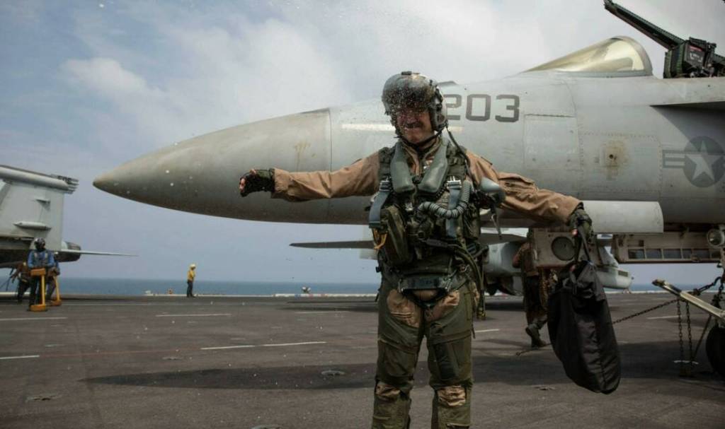 Courtesy photo
A U.S. Navy officer, assigned to Strike Fighter Squadron (VFA) 14, celebrates a change of command aboard the Nimitz-class aircraft carrier USS Abraham Lincoln (CVN 72).