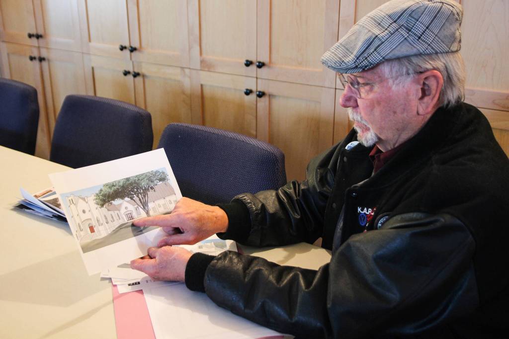 (Photo by Luisa Loi)
Bill Waite shows a rendering of the churchs new look, which will be completed sometime this spring.