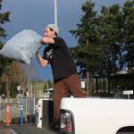 Photo by Ian Tiessen
Warren Blazich throws a bag of trash into the dump at the Island County Transfer Station.
