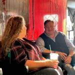 Photo by Sam Fletcher
 Oak Harbor Mayor Ronnie Wright chats with Teresa Besaw, marketing coordinator of Oak Harbor Main Street, Friday morning.