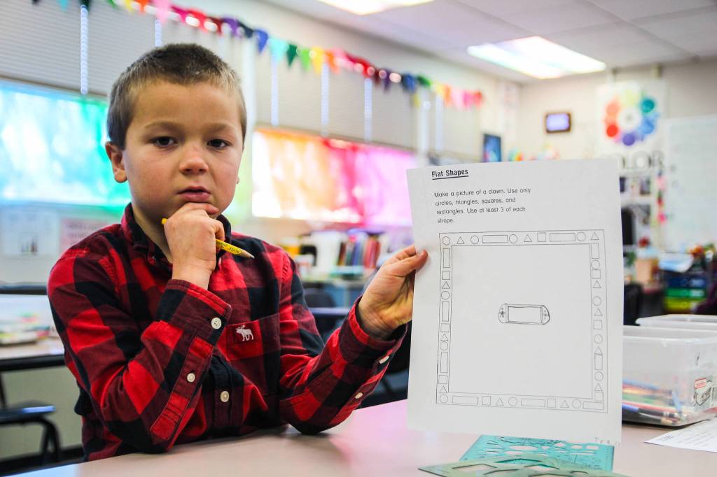 Photo by Luisa Loi
Trace Bull shows off his realistic Nintendo Switch drawing.