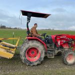 Bart Crowder, president of the Farm Bureau, drives a tractor on the 1902 Ranch in Coupeville. (Photo provided)