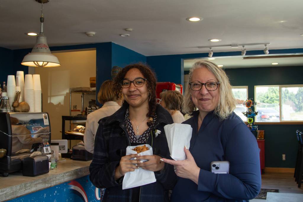 Photo by Caitlyn Anderson
Payton, left, and Stephanie Osborne pose for a picture with their recently purchased scones at Jupiter Coffee.