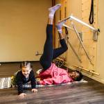 Photo by Luisa Loi
Glenn crawls around The Barre Crawl while his mom works out. The small fitness center is a place where parents can exercise while their kids play or cling to them.
