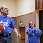 (Photo by Luisa Loi)
At right, Dagny Schellenberg roots for teammate Michael Murcrey. Coach Shari Mays said she has never met a more supportive team.