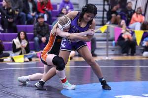038 – Oak Harbor’s Sarai Egli placed first at 130 pounds in the District 1 3A girls wrestling tournament held at Oak Harbor High School. She will compete at the Mat Classic Feb. 20-21 at the Tacoma Dome. Photo by John Fisken.