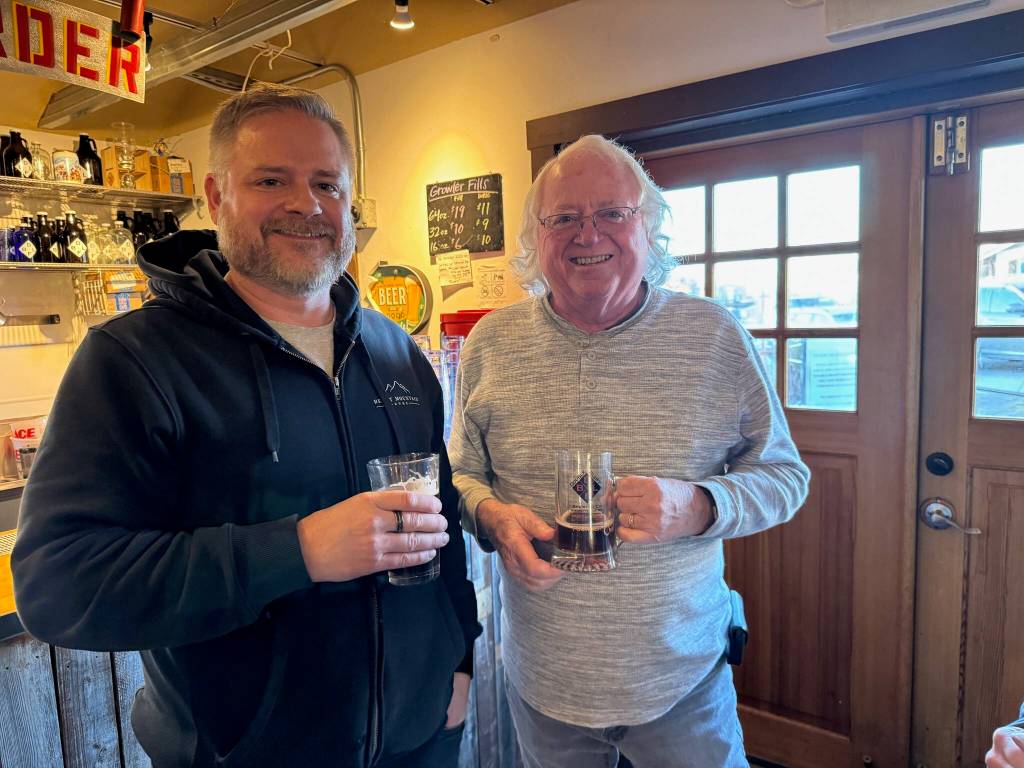 (Photo provided)
Bob Herzberg enjoys a beer with his son, Josh.