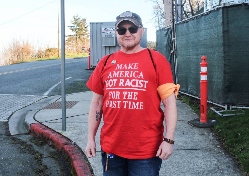 (Photo by Luisa Loi) Wolfgang Nyland wore a shirt saying Make America Not Racist For The First Time.