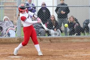 Photo by John Fisken

Chelsi Stevens blasts a big-time hit.