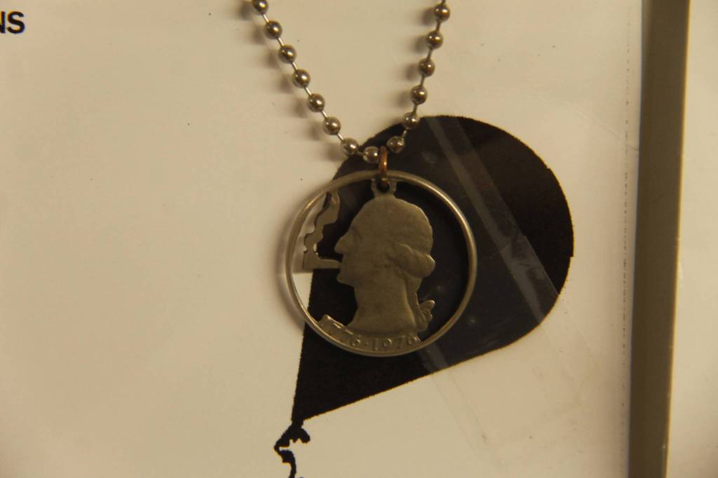 (Photo by Kira Erickson/South Whidbey Record)
George Washington smokes a doobie in this pendant made from a U.S. quarter.