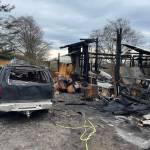 Photo by Jobie Gause
A fire on North Whidbey March 26 destroyed two structures and a truck.