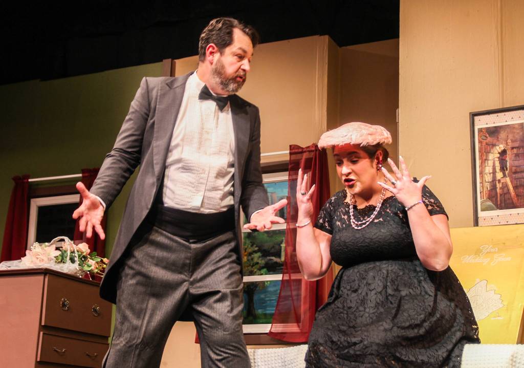 (Photo by Luisa Loi)
Roy and Norma Hubley (Nate Edmiston and Shealyn Christie) argue while their daughter is locked in the bathroom door on her wedding day.
