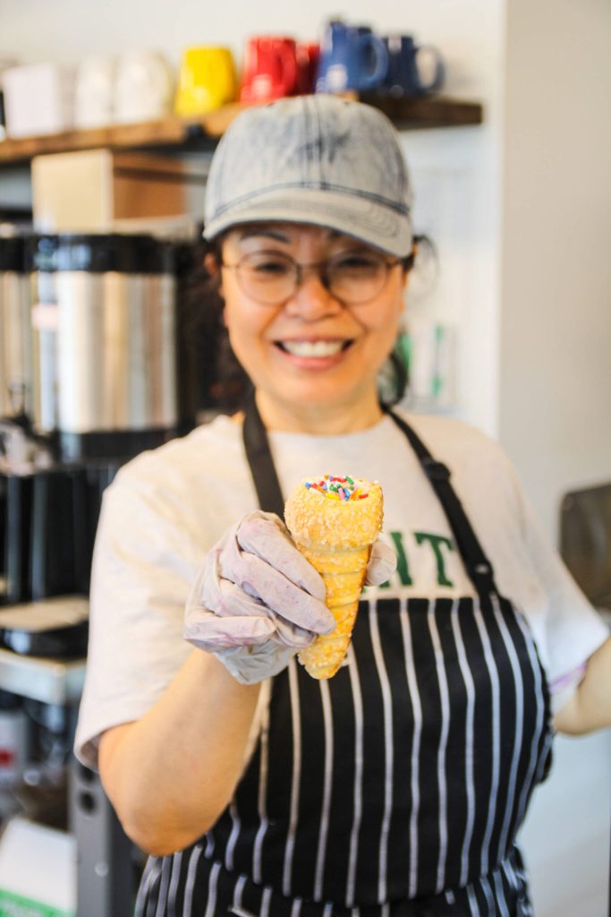Okhui Chang shows a cream horn. (Photo by Luisa Loi)