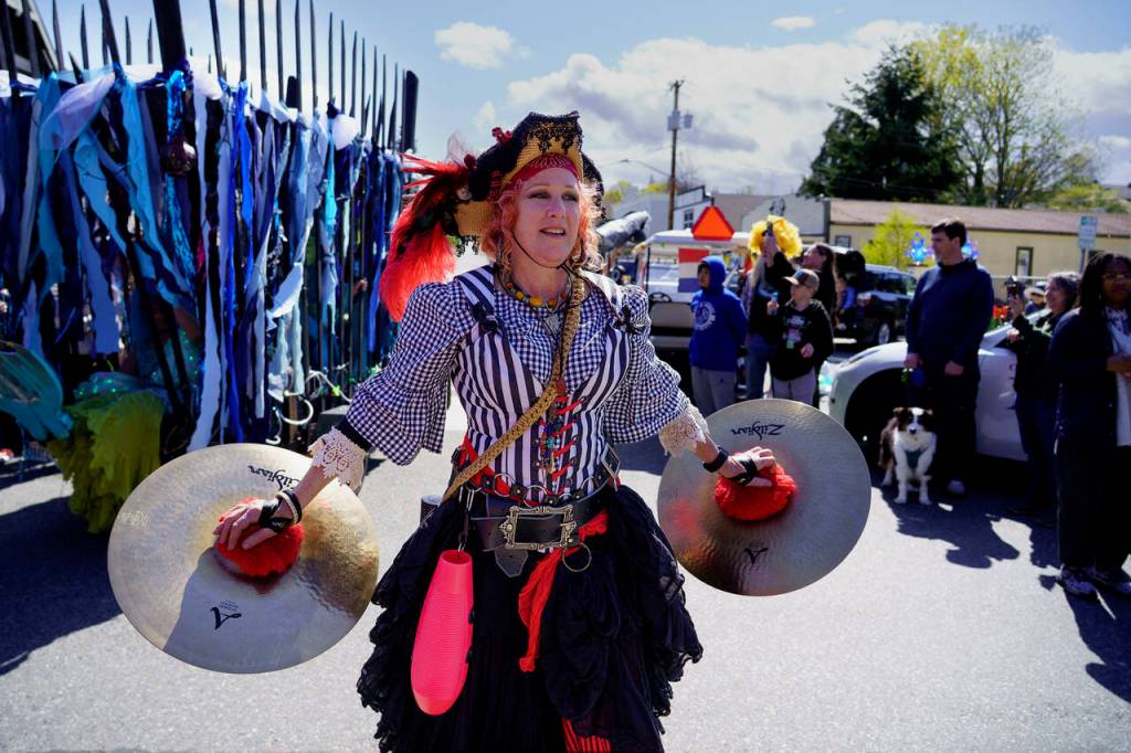 Pirate Siobhan Wright plays the cymbals. (Photo by David Welton)
