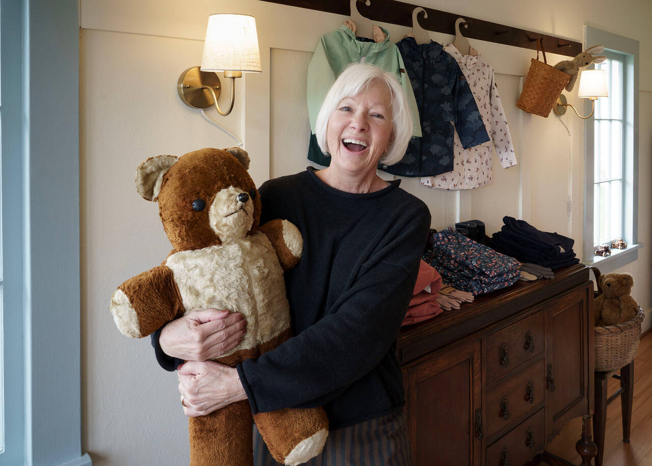 Diane Sorensen with Hot Dog, a stuffed animal that is over 100 years old. (Photo by David Welton)