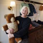 Diane Sorensen with Hot Dog, a stuffed animal that is over 100 years old. (Photo by David Welton)
