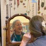 Susan Sandri checks out some bling at the sale.