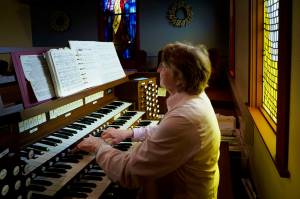 Kathy Fox has played the organ and piano at Langley United Methodist Church for the past 50 years. (Photo by David Welton)