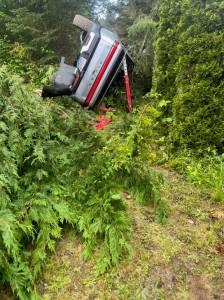 Photo by South Whidbey Fire/EMS
A Freeland man sustained non-life-threatening injuries in a rollover crash Monday morning.
