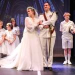 Maria and Georg (Karina Andrew and Jordan Kingma) get married surrounded by their children. From left, Sunny Thuet (Louisa von Trapp), Luna Strong (Gretl von Trapp), Evie Christie (Marta von Trapp). Behond them, at left, Lexi Thuet (Brigitta von Trapp) and Hannah Mayne (Leisl von Trapp). On the right side, at left, Cillian Burke (Friedrich von Trapp) and Rowan McDonald (Kurt von Trapp) (Photo by Luisa Loi)