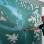 Retired Speech and Language Pathologist turned Docent Volunteer, Jeanne Amundsen, describes the route ships take before encountering the Admiralty Head Lighthouse. (Photo by Marina Blatt)