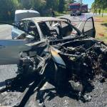 Fortunately, no one was injured in a two-car crash earlier this week in Freeland that resulted in the total loss of this car that caught on fire. (Photo by South Whidbey Fire/EMS)