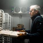 Photo courtesy of Island Senior Resources
Volunteer Brad Crain prepares frozen meals for distribution to other sites for volunteers to get ready to deliver to their clients.
