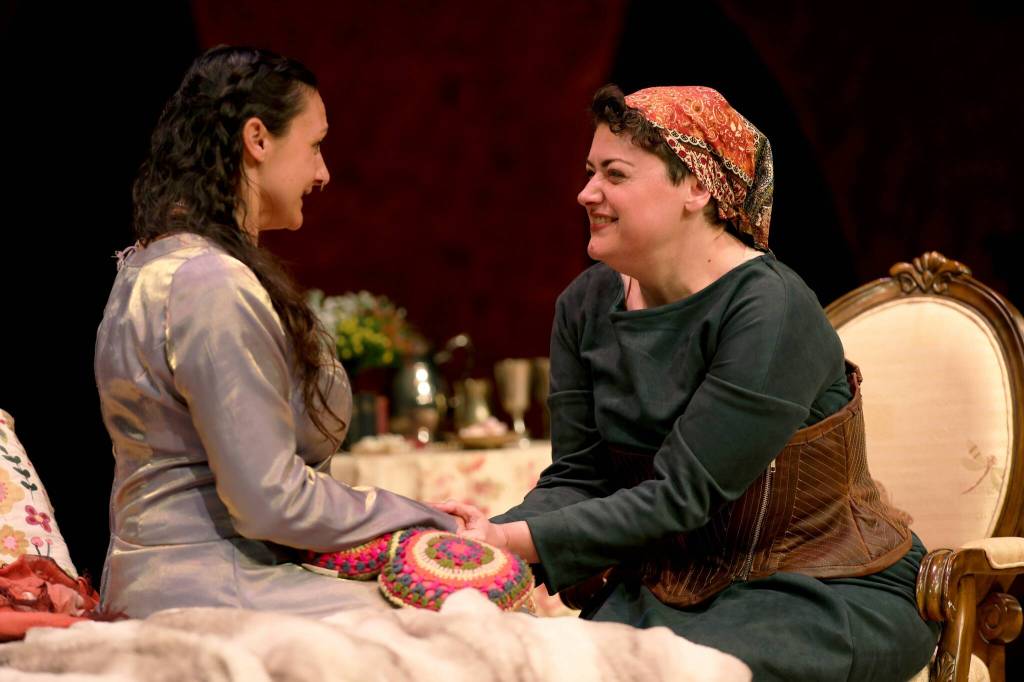 Photo courtesy of Whidbey Island Center for the Arts
Ophelia (Valerie Anne Huntington) shares a joyous conversation with Anna (Jessica Robins/J. Rob).