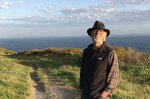 Photo provided by Kris Wilcox. Ken Wilcox takes in the view during a Fort Ebey hike in April.
