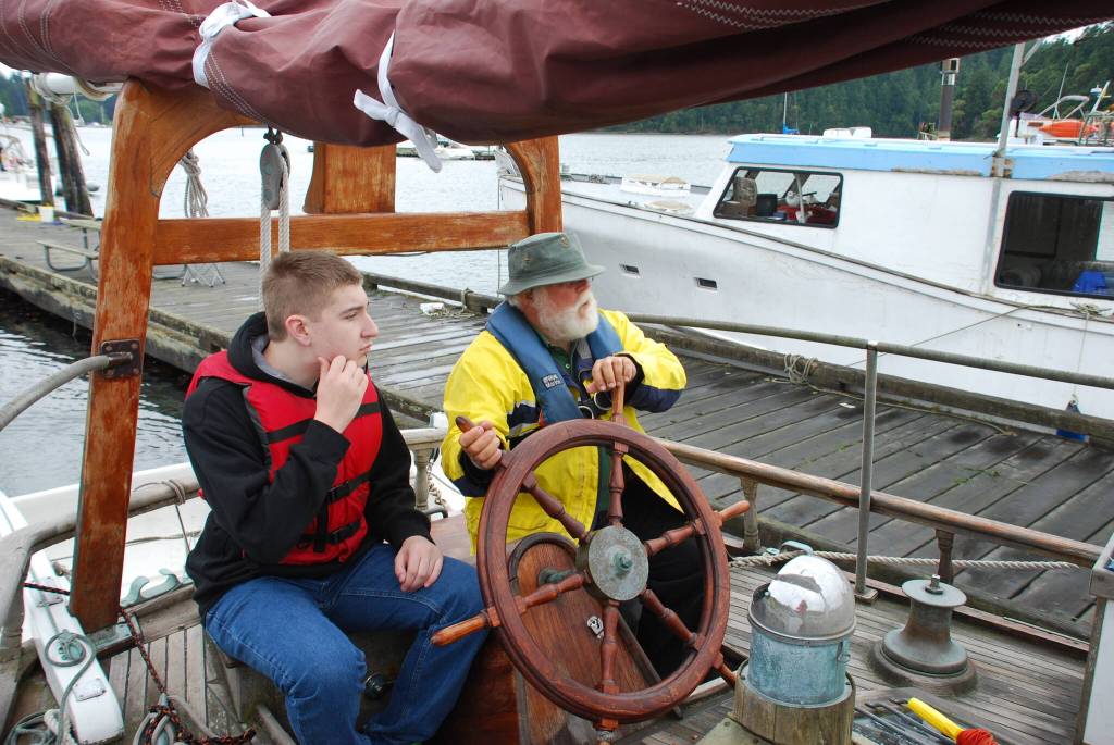 John Stone teaches a student to take the wheel (Photo provided)