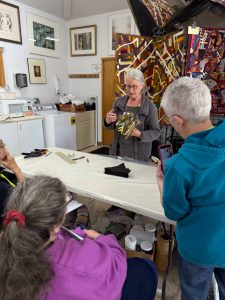 Teacher Elin Noble demonstrates a technique (Photo by Matt Neinhuis)
