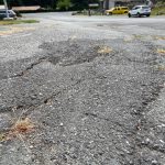 Photo by Marina Blatt
A raised patch of asphalt breaks up Southwest Lopez Road