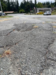 Photo by Marina Blatt
A raised patch of asphalt breaks up Southwest Lopez Road