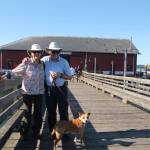 (Photo by Maina Blatt) Rand and Janie Collins and their dog Ginger visit the wharf from Mount Vernon.